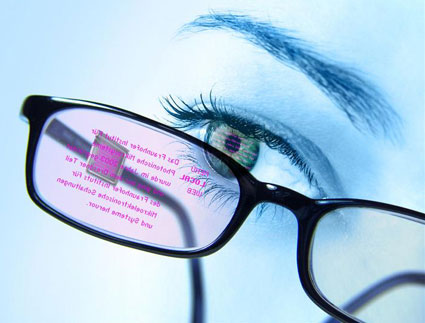 Interactive Eyeglasses with Bidirectional OLED CMOS Chip in the Temple, PDA Connection, and Eye-Tracker